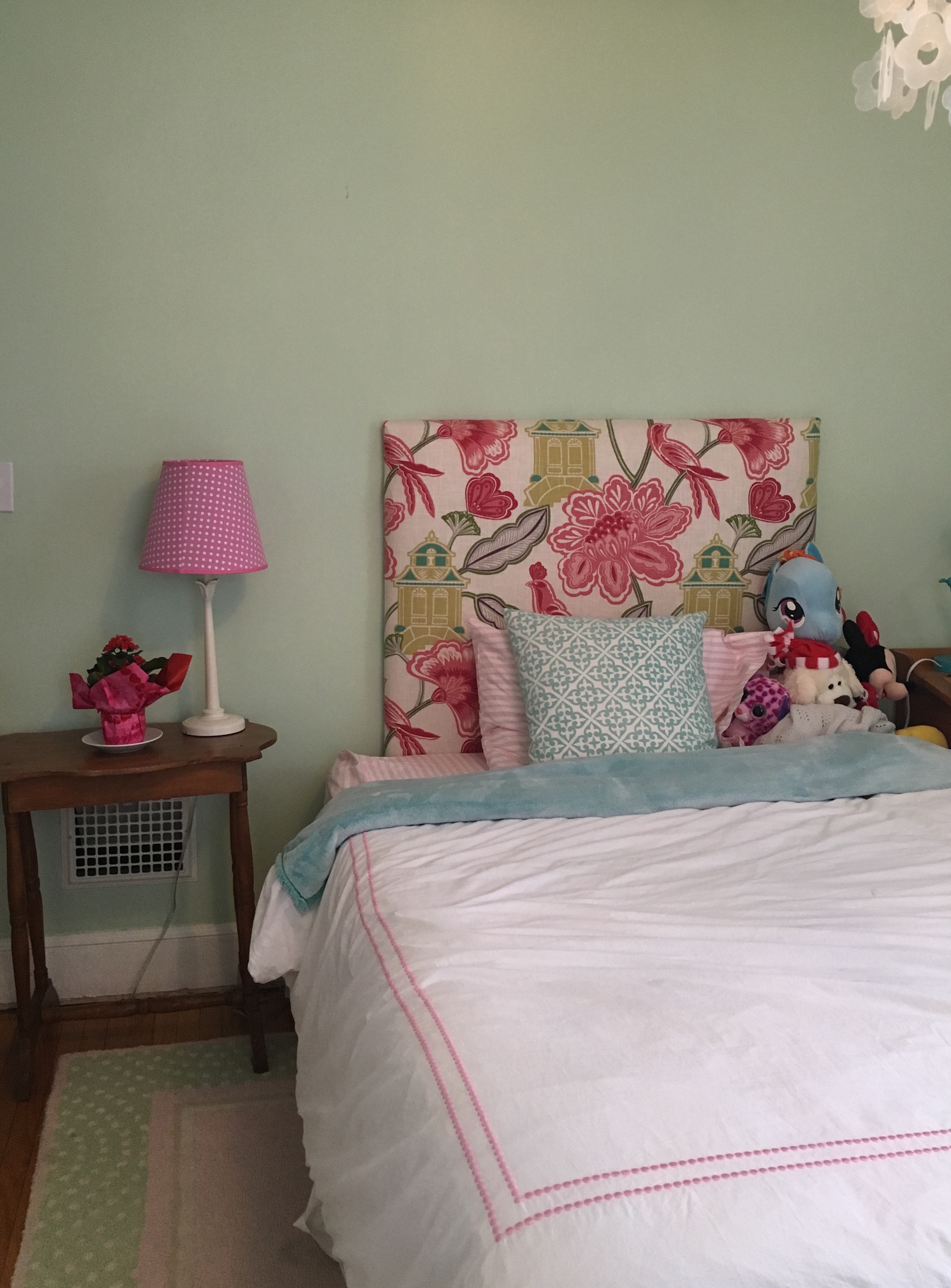 BEFORE- I still love the headboard I made, but with the refresh we can bring in art and more personality